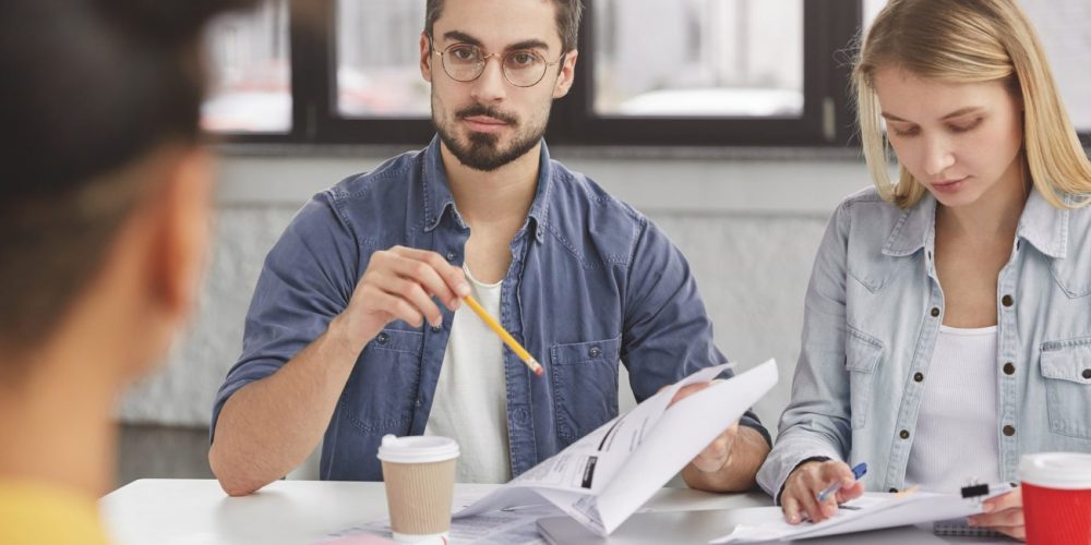 young-colleagues-have-formal-meeting-discuss-solutions-study-documents-prepare-marketing-project--e1637187396167-pg7t9y22xa9comzyf8xuf2lbttiis0m28yf6f6lklk